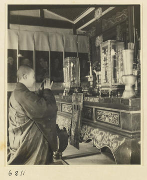 Hedda Morrison, Buddhist Nun Kneeling at Altar, ca. 1933-1946, Harvard-Yenching Library, HM01.6811,  https://nrs.harvard.edu/URN-3:FHCL:198