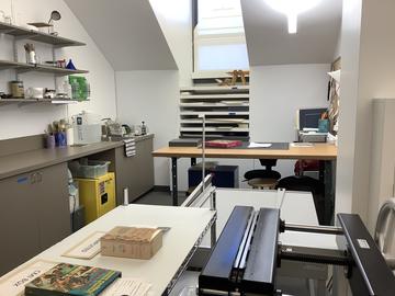 A compact lab space full of conservation equipment.