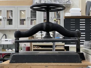 A book press in a conservation lab.