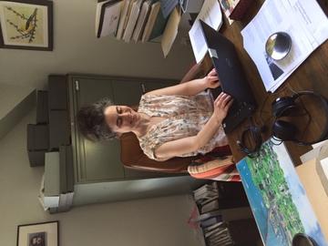 Amanda Maloney working at her computer from home