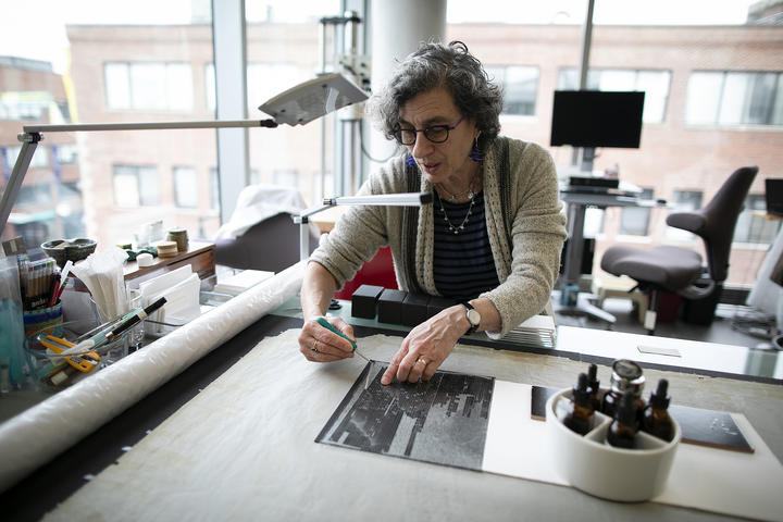 Helen H. Glaser Conservator Debora Mayer prepares collections for treatment using high-resolution, digitally scanned images, which are then entered into a database to preserve records of how and when items were treated.