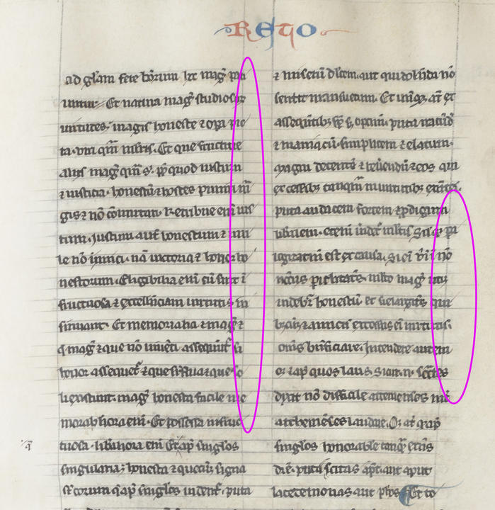  a page showing short pen strokes written in a different hand which act as hyphens for words that span the line break.