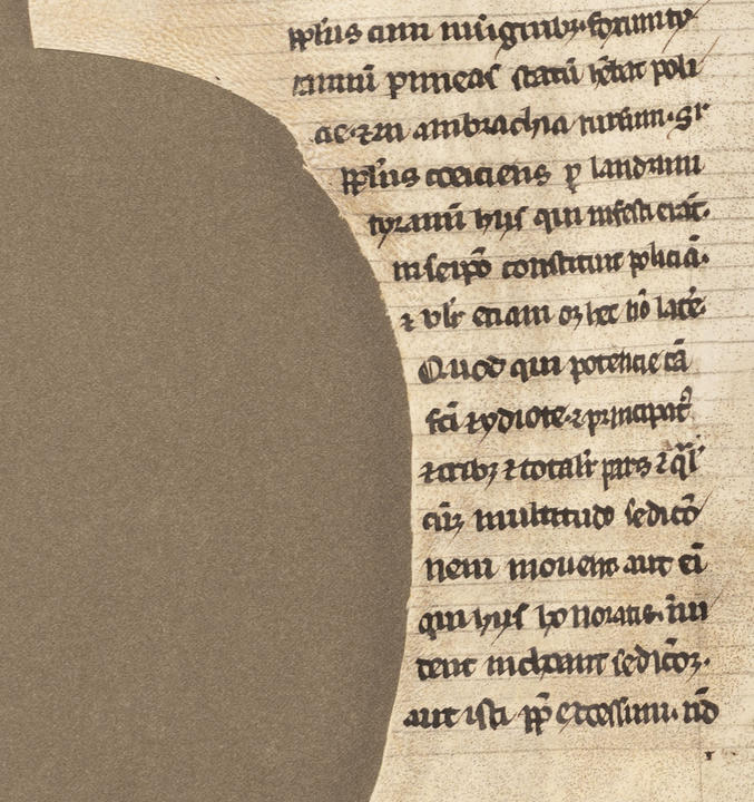 An curved edge of a piece of parchment and how the writing was made to fit the page.