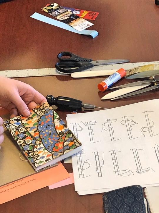 Instructions and tools for making Japanese books.