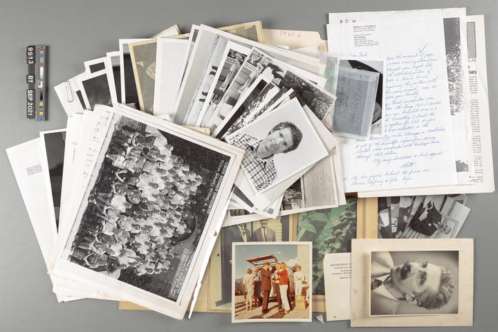 A collection of photographs and paper from spread out to show the variety.