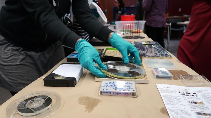 Reel to reel tape being salvaged.